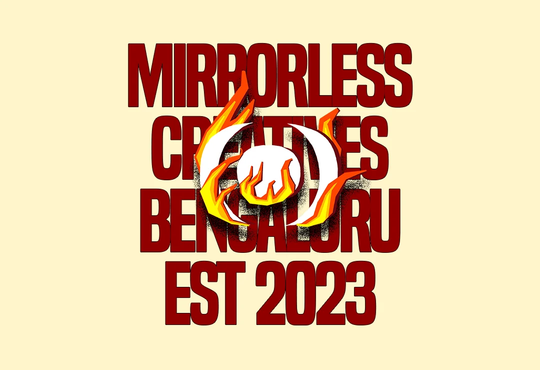 Poster: Mirrorless Creatives, Bengaluru, est 2023, with the lens mark on fire.