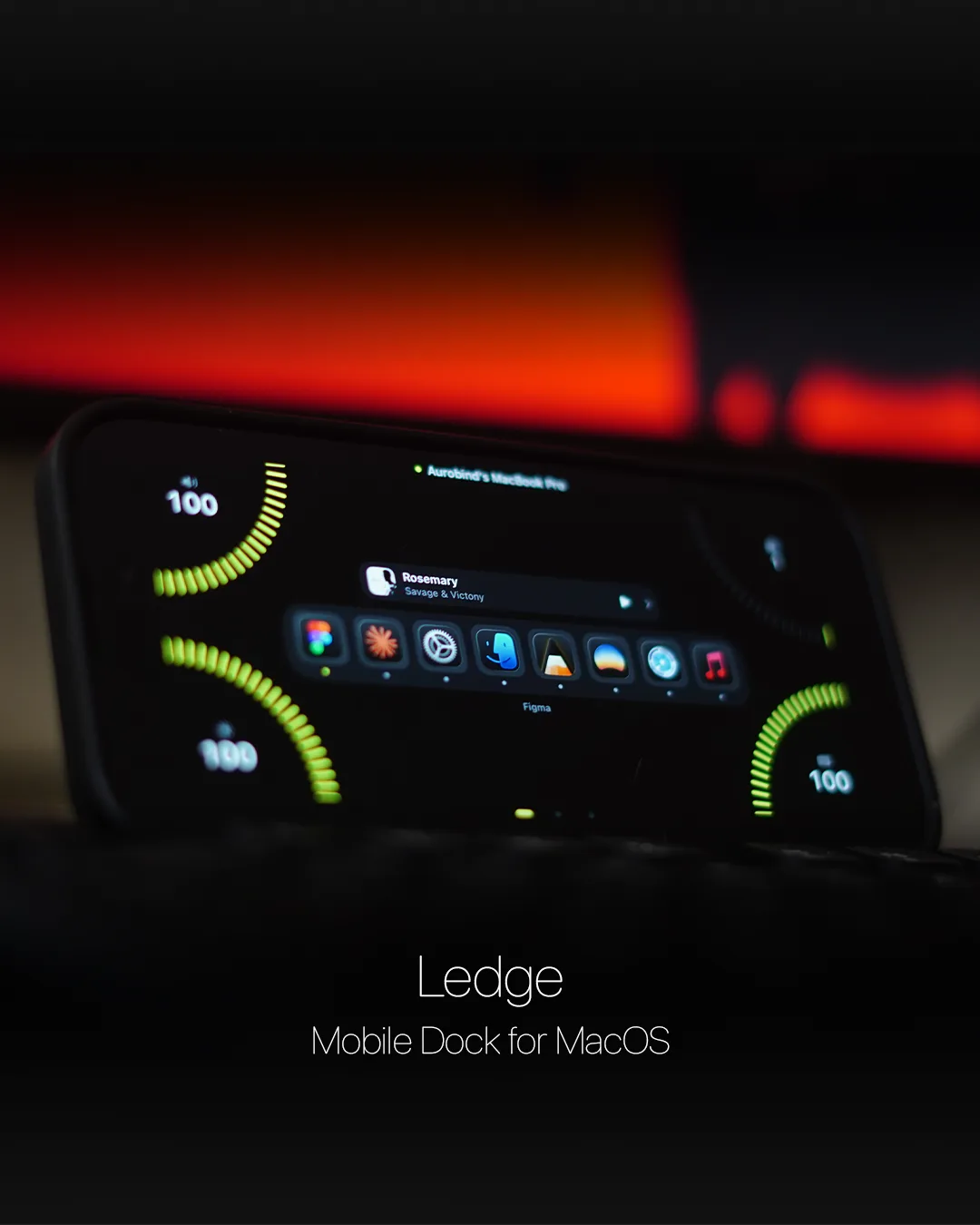 Ledge running on a phone propped beside a Mac, a dark dock with lime dials for volume and brightness.